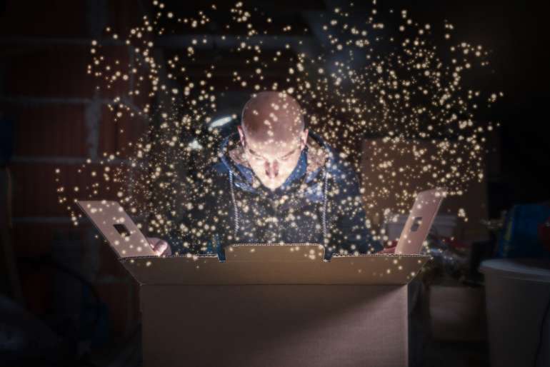 Man opening a magical box
